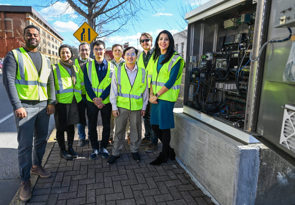 Mina Sartipi and students at the test bed at Friday, Jan. 27, 2023 at the corner of MLK and Georgia Avenue.