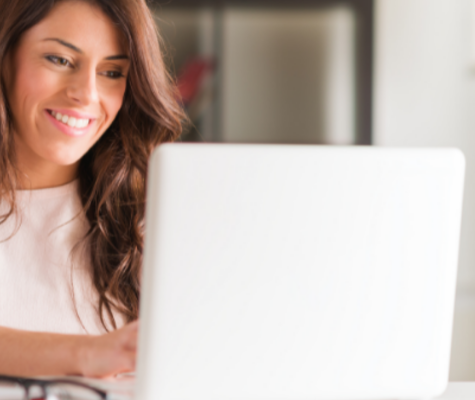 Girl typing on a computer