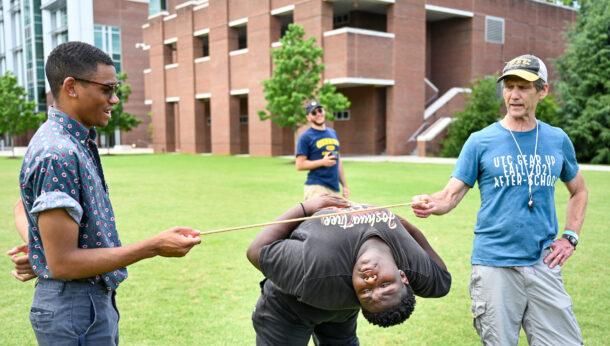 Gear Up field games, Thursday, June 2, 2022, included students and GEAR UP Director Hunter Huckabay (right).