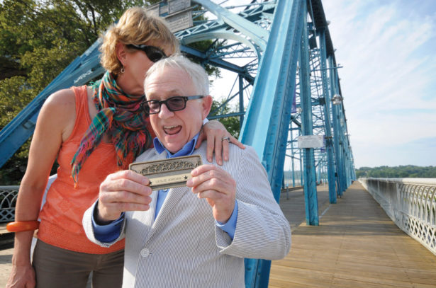 Leslie Jordan, shown here in a 2011 photo after receiving his Walnut Street Bridge plaque from childhood friend Nina Jones Chapin. Photo courtesy of Chattanooga Times Free Press.