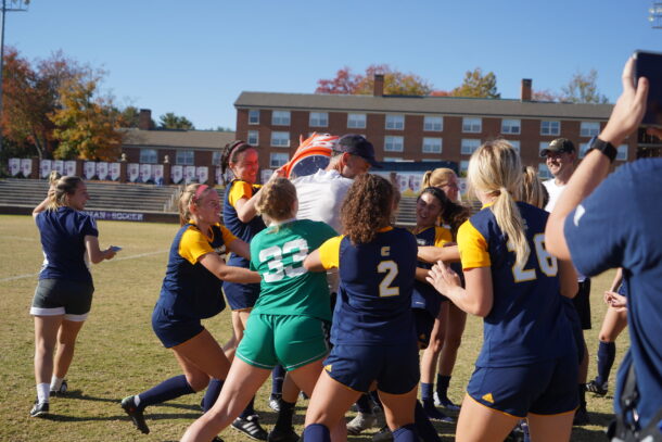 The Mocs soccer team doused Head Coach Gavin McKinney after clinching the program's first-ever Southern Conference regular-season title. Photo credit: Furman Athletics.