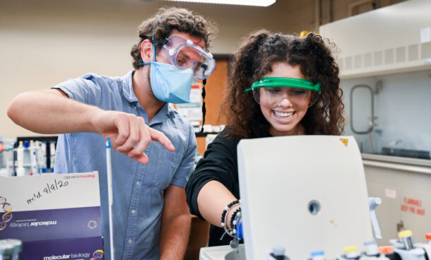 Professor Ben Stein works with student Zayda Dominick Tuesday, Oct. 25, 2022 in Grote Hall.