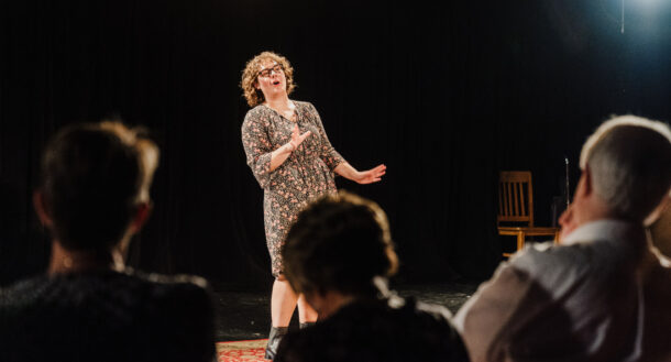 UTC senior theatre major Ellen Rich performs Pat Wilcox’s monologue during "Unmasking: Elders Speak." Photo by Brooke Bragger.