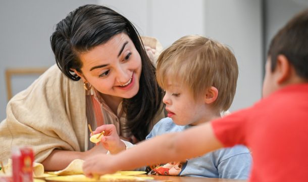 Mckenna Menard works with children in the Downside Up class at White Oak Methodist Church in Red Bank.