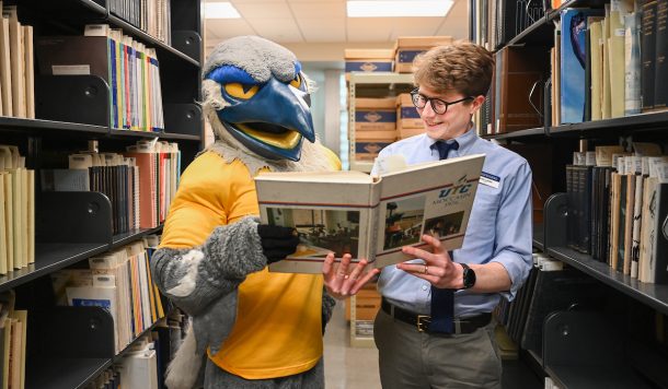 Scrappy and University Archivist Noah Lasley