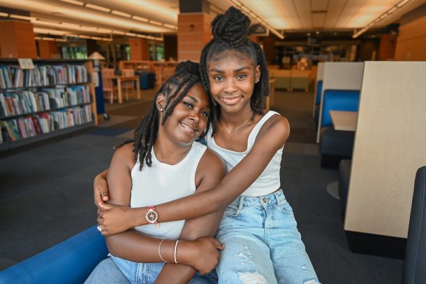 Rakiesha Lewis (left) and her daughter, Taylor, at the UTC Library. 