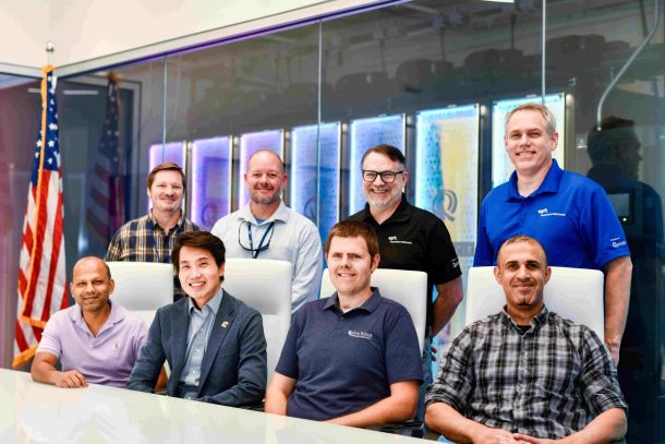 UTC Quantum Center CTO and Assistant Professor of Physics Tian Li (sitting, second from left) and other leaders from Qubitekk, EPB and Oak Ridge National Laboratory gather at the EPB Quantum Network℠ powered by Qubitekk in Chattanooga. Photo courtesy of EPB.