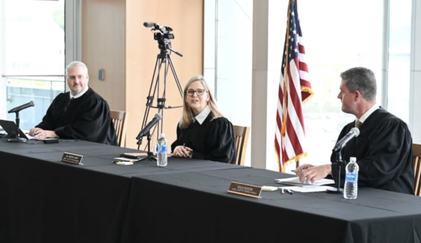 From left, judges Tom Greenholtz, Jill Bartee Ayers and Kyle A. Hixson of the Tennessee Court of Criminal Appeals preside over cases in the UTC Library Roth Grand Reading Room on Oct. 23, 2024.