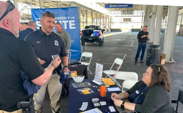 Lt. Adam Emery, a UTC alum who oversees the homicide division at the Chattanooga Police Department, chats with UTC Criminal Justice Professor Sherah Basham about the University’s online bachelor’s degree program at the 2023 first-responder appreciation event. Photo by Charlie Reed.