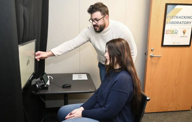 Dr. Bret Eschman and graduate student Bailee Smith in the Visual Memory and Attention Development Lab.