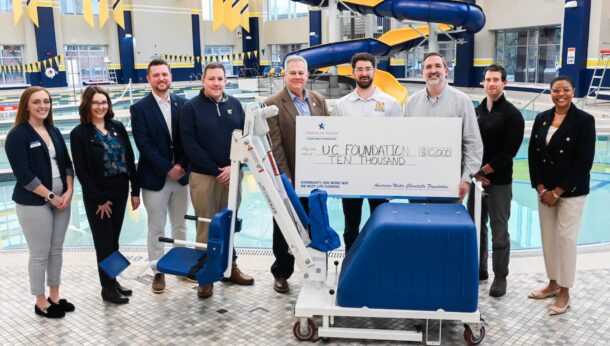 A chair lift unveiling at the UTC Aquatic and Recreation Center took place on Wednesday, Feb. 12, 2025. From left: Kate Dennis (Aquatics and Safety Coordinator), Daphne Kirksey (External Affairs Manager, Tennessee American Water), Ryan Jones (Senior Associate Athletics Director for Advancement), Brent Goldberg (Vice Chancellor for Finance and Administration), Grant Evitts (President, Tennessee American Water), Corbin Hedges (Associate Director for Campus Recreation), Aaron Grisham (Executive Director of University Center and Aquatic and Recreation Center), Trevor Yacopino (Maintenance Technician, Campus Recreation), Dr. Artanya Wesley (Vice Chancellor of Enrollment Management and Student Affairs). 