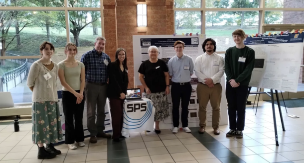 UTC Society of Physics Students members present their LEGOLAS project at the 2024 Southeastern Section of the American Physical Society meeting in Charlotte, North Carolina. From left: Emery Rutledge, Olivia Ziemer, Dr. Joshua Hamblen, Megan Black, Dr. Tatiana Allen, Samuel Glandon, Ike Deitch and Evan Humberd (photo courtesy of Dr. Tatiana Allen).