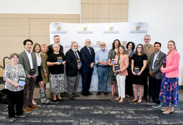 From left: Michelle Evans, Tian Li, Beth Crawford, Jamie Harvey, Tatiana Allen, Chuck Margraves, Gary McDonald, Provost Jerold Hale, Irv Resnick, Hilary Browder-Terry, Dawn Ford, Laurie Melnik Allen, Monica Miles, Interim Chancellor Robert Dooley, Jejal Bathi and Ruth Walker.