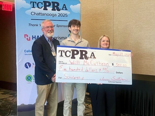 UTC Executive Video Producer Mike Andrews, left, student videographer Will McCutcheon and TCPRA President Bobbie Maynard