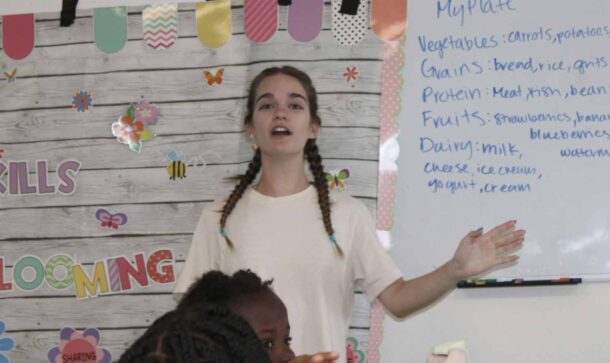 Gillian Morton talks to the Camp Bloom campers about nutrition and balanced meals.