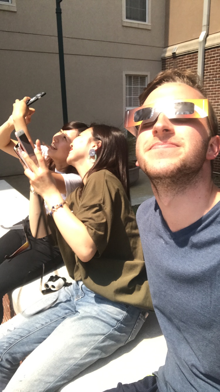 Go Global Community watches and take photos of the solar eclipse