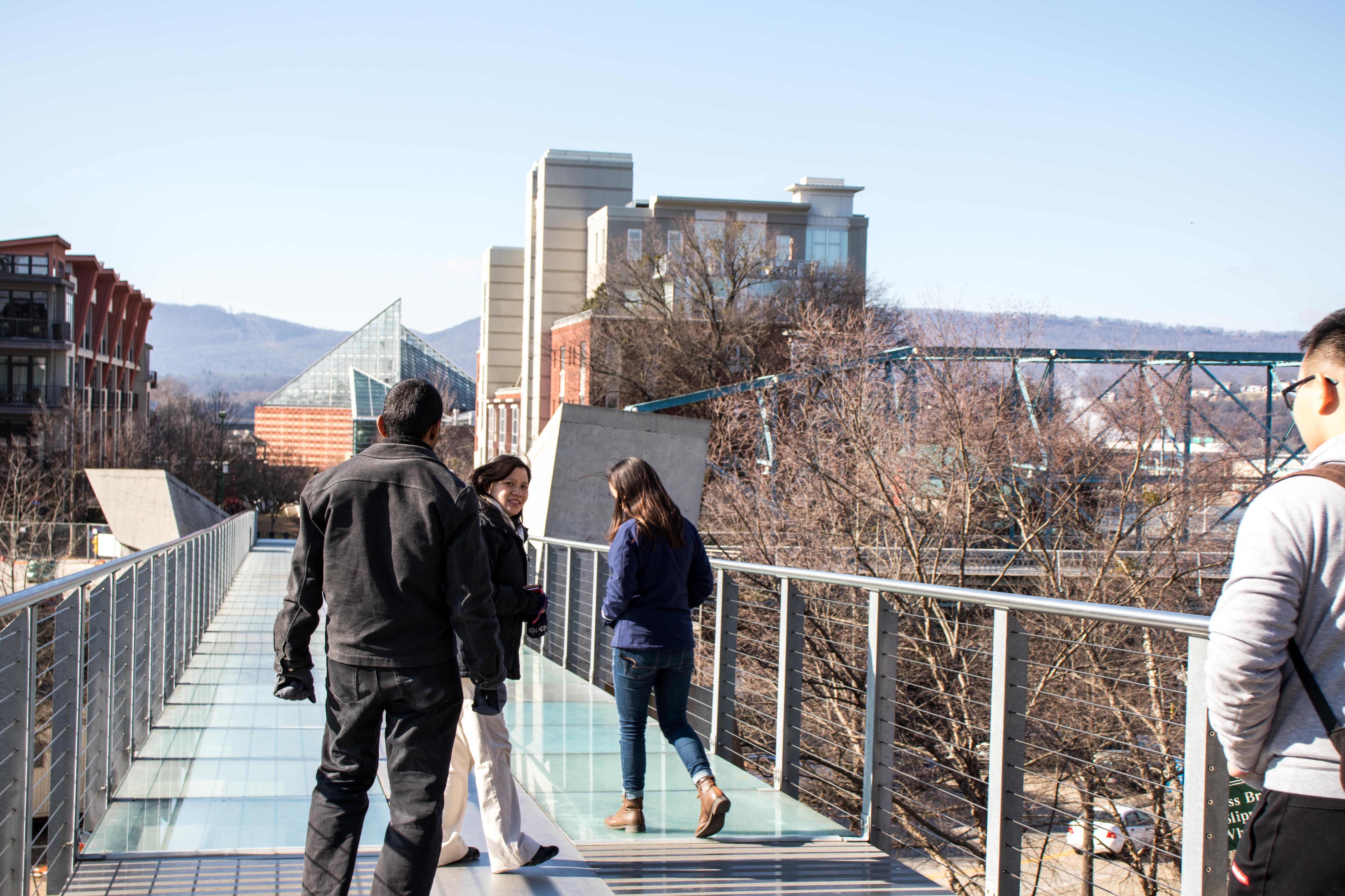 Students venture onto the glass bridge in downtown Chattanooga.