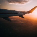 airplane over a sunset