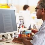 man learning Microsoft Word