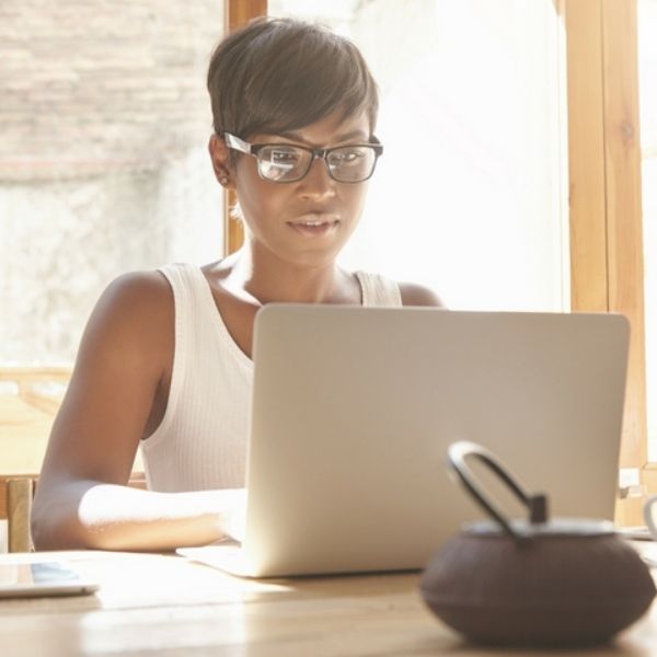 female working at her laptop