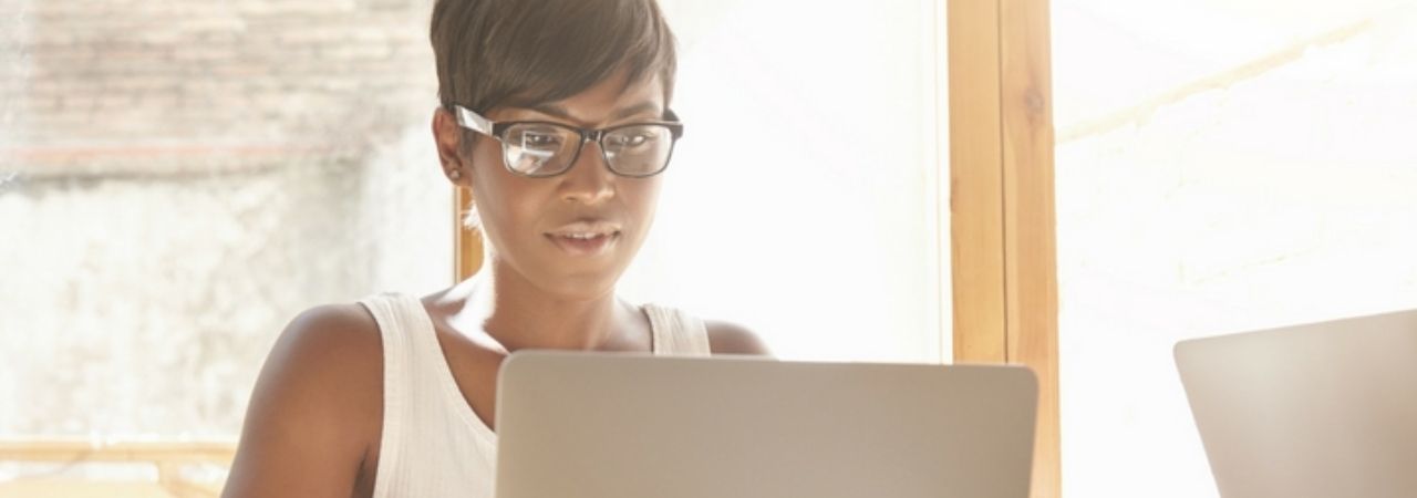 female working at her laptop