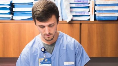 male nurse looking down