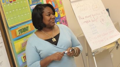 African-American female teaching elementary school