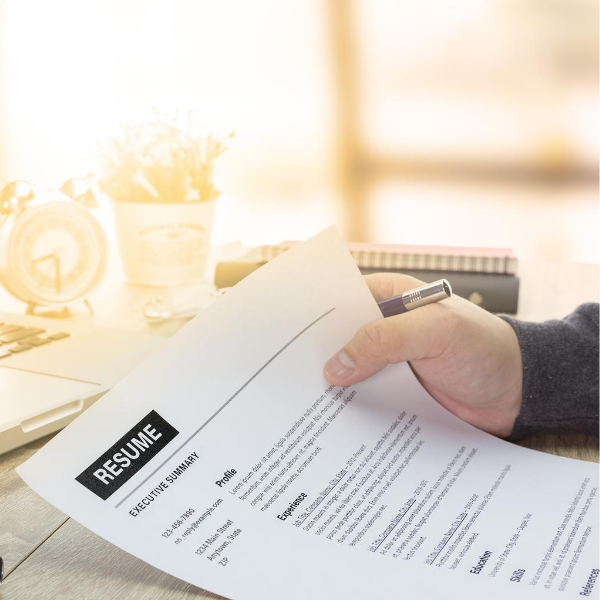 Man holding a resume