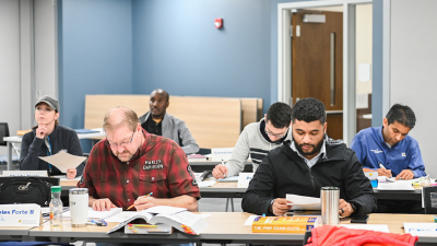 students preparing for pmp exam in a prep course