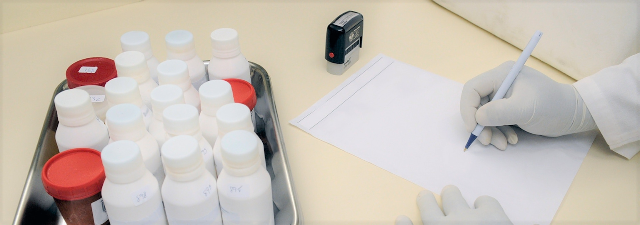 pharmacist writing prescription