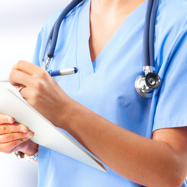 nurse writing on a clipboard