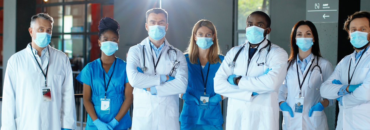 Team of medical professionals wearing masks