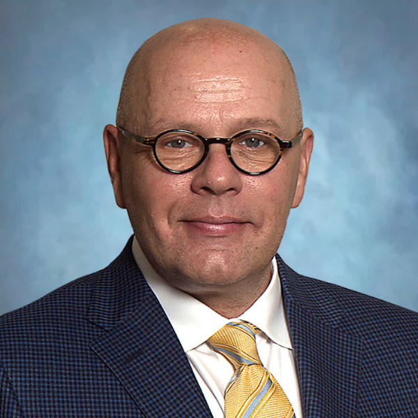 Gene Pledger headshot