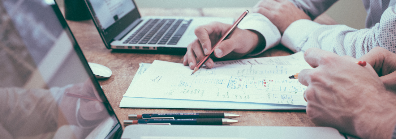 two males working on projects