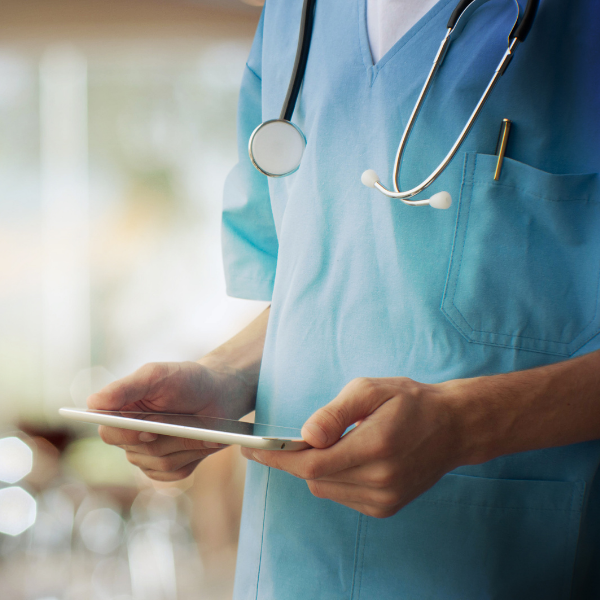 nurse holding an iPad