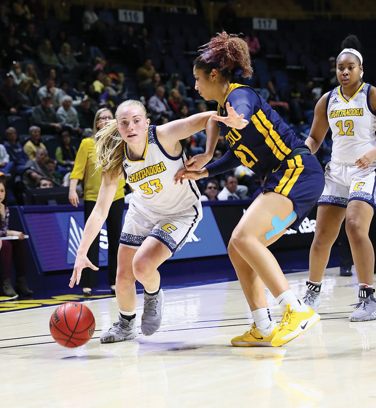 Lakelyn Bouldin dribbles past a defender
