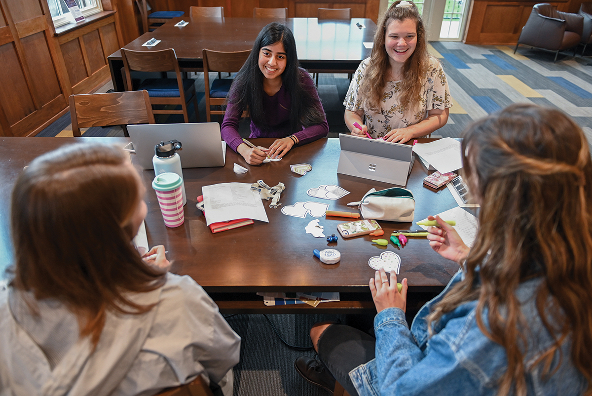 Shriya Purohit, Emily Hemingway, Jesse Hayes and Sydney Ellis, clockwise from left, talk Thursday, Feb.13, 2020 in Guerry Center.