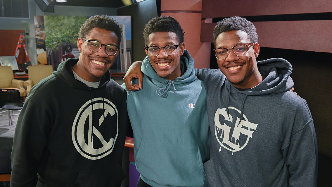 Triplets Chris, Chancey and Caleb Figures, from left, Friday, Feb. 4, 2021 in the Metro studio.