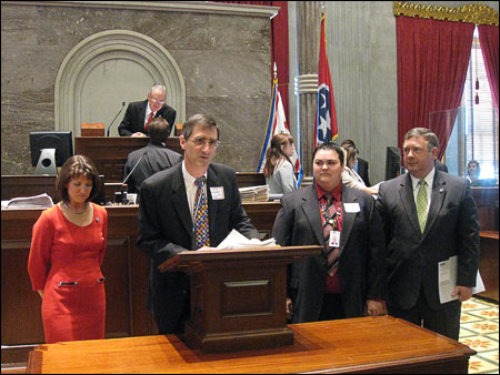 From the floor with scholarship award-- Rep. Susan Lynn, Nathan Ridley from the Lobbyists Association, Kimsey, and Kimsey's state representative, Rep. Mark Maddox Fourth