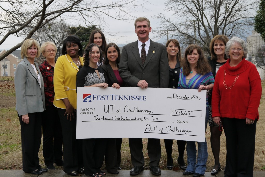 Chancellor Steven Angle accepts a check for the Jean Bradford Memorial Scholarship from members of the Chattanooga Chapter of the EWI