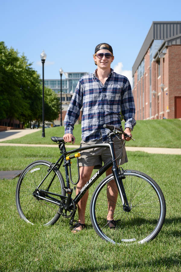 Man with Bicycle on Campus