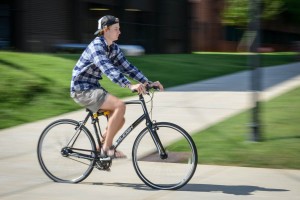 Man with Bicycle on Campus