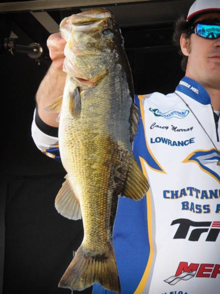 UTC Student Holding Up Fish at Tournament