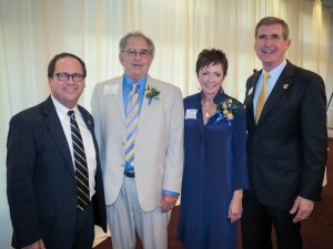 Mike Griffin, Alumni Board President;  Bill Landry, 2015 Distinguished Alumnus; Kim White, 2015 Outstanding Service Award recipient;  UTC Chancellor Steve Angle