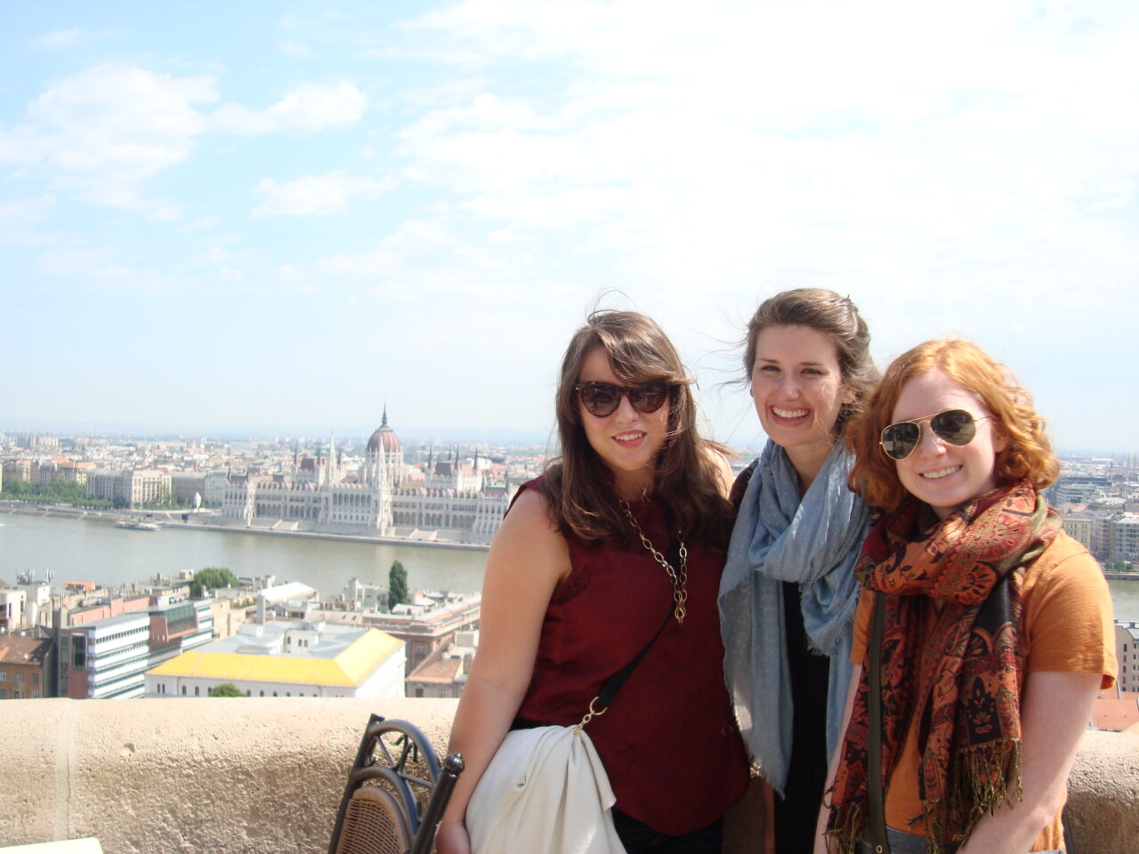 Lindsey Layman, Hayley Little, & Libby Boykin, overlooking the Danube with the Parliament Building in Budapest in the background