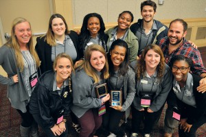 CAB team holding awards of excellence