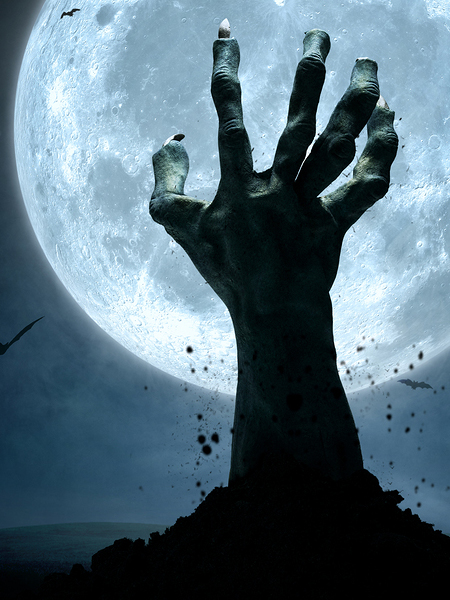 Hand rising from a grave in front of a full moon