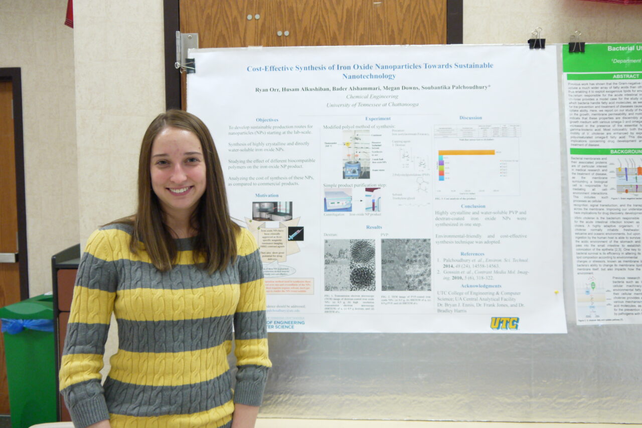 UTC Student Megan Downs with her poster, "Cost-Effective Synthesis of Iron Oxide Nanoparticles Towards Sustainable Nanotechnology" at Research Dialogues 2016