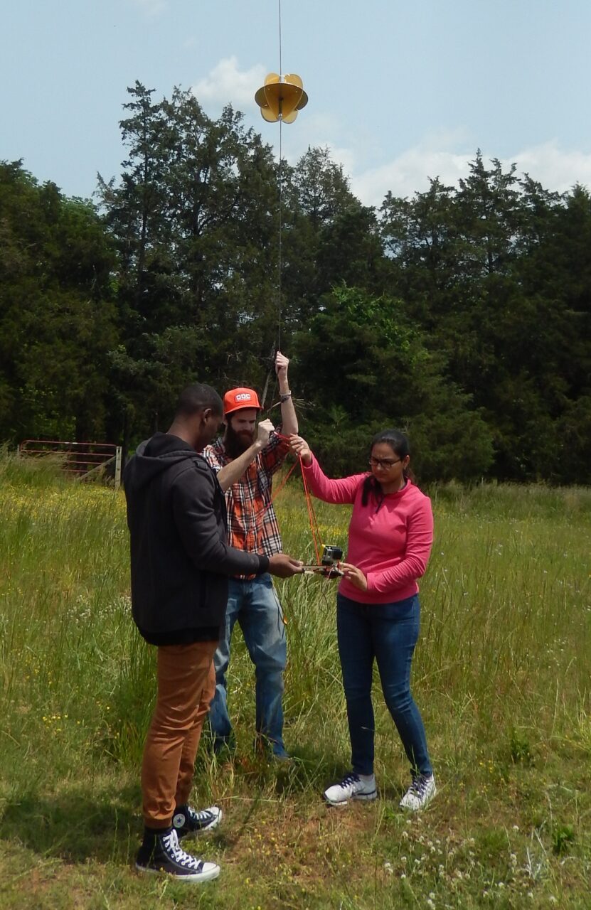 Samaa Davies, Matt Joplin, and and Amee Patel doing final systems check before releasing balloon