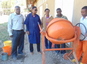 Research Team at MUST: Mr. Joseph Mnkeni and Ms. Shamsa Nassibu, Instructors at MUST; Dr. Mbaki Onyango Ass. Prof at UTC and Ayubu Daniel and Isaya Benard, helping with block making.